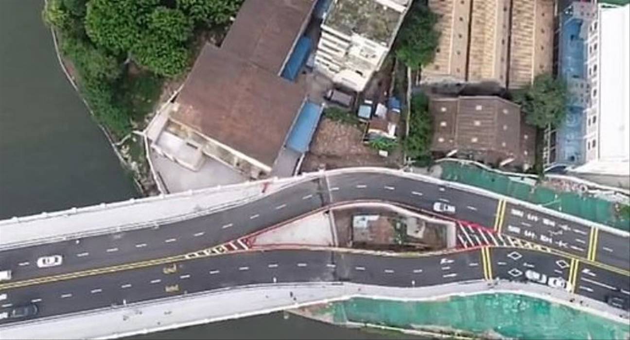 Chinese City Builds Motorway Bridge Around Tiny House After Owner ...