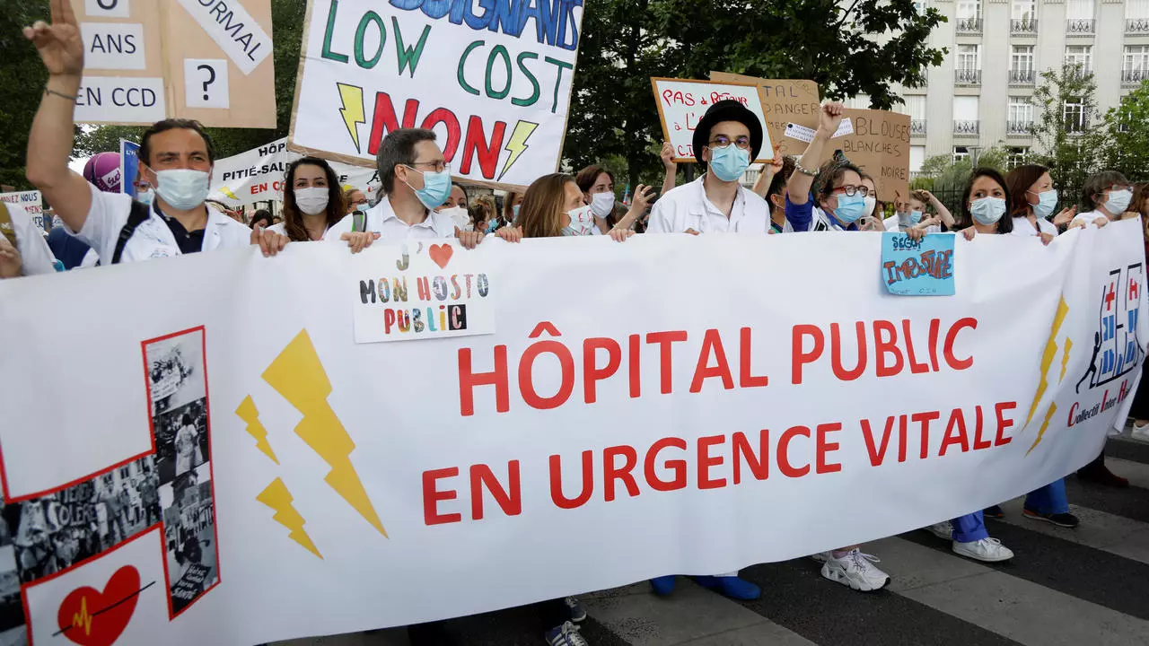 Enough applause: French health workers rally anew for substantive reform